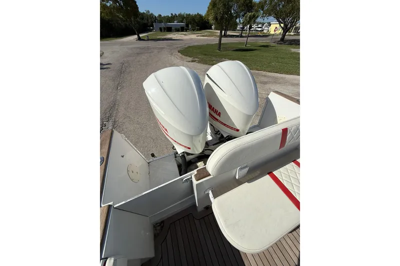Slide: The Image of 2006 Buddy Davis 34 Center Console with twin Yamaha outboard engines. - 16