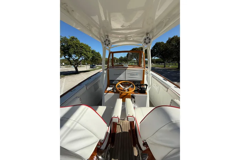 Slide: The Image of 2006 Buddy Davis 34 Center Console boat interior with Garmin navigation system. - 21
