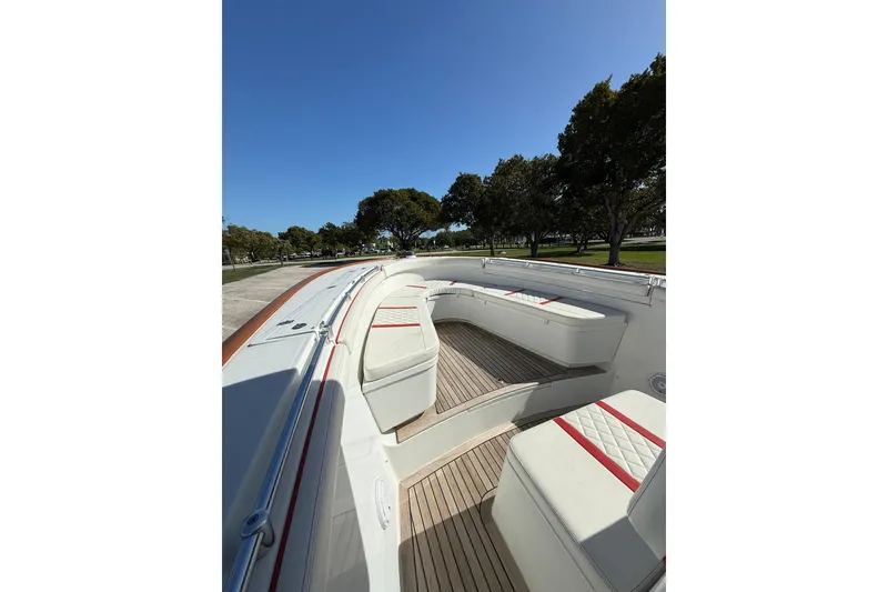 Slide: The Image of 2006 Buddy Davis 34 Center Console boat with spacious seating and sleek design. - 37