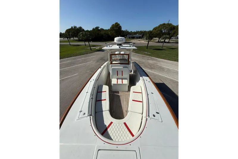 Slide: The Image of 2006 Buddy Davis 34 Center Console boat with spacious seating and sleek design. - 48