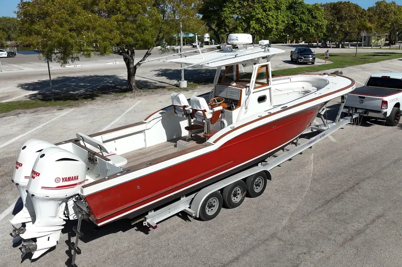 Slide: The Image of 2006 Buddy Davis 34 Center Console boat on trailer with Yamaha engines. - 6