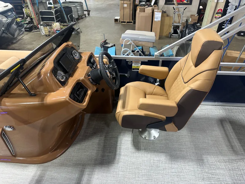 Slide: The Image of Tahoe LTZ 200HP VRB Windshield 2385 Swingback Tritoon $55995 2025 - 12