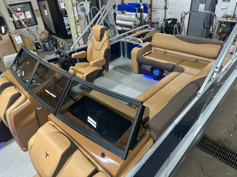 Slide: The Image of Tahoe LTZ 200HP VRB Windshield 2385 Swingback Tritoon $55995 2025 - 4