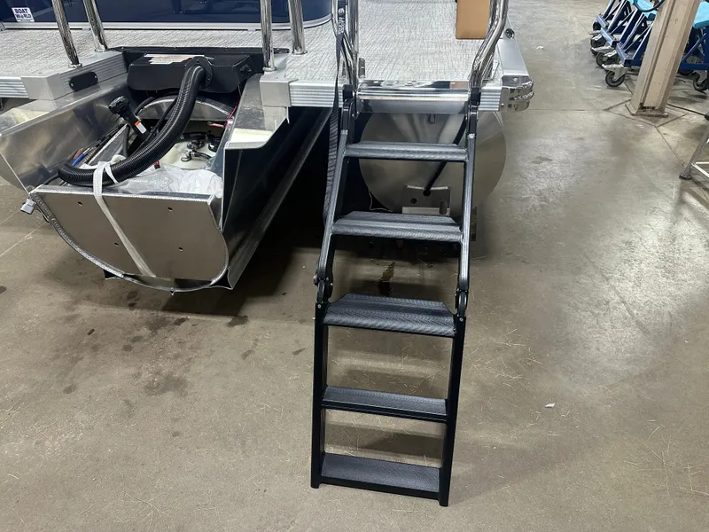 Slide: The Image of Tahoe LTZ 200HP VRB Windshield 2385 Swingback Tritoon $55995 2025 - 46