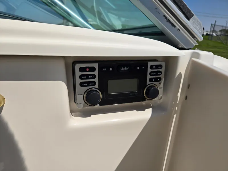 Slide: The Image of 2011 Chaparral 196 SSi boat stereo system with control panel. - 17