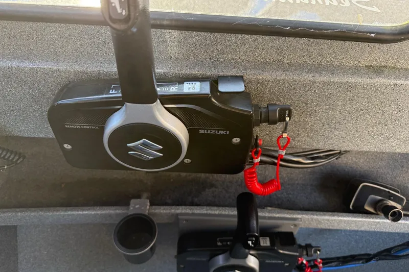 Slide: The Image of Suzuki remote control in a 2016 North River Seahawk boat cockpit. - 14