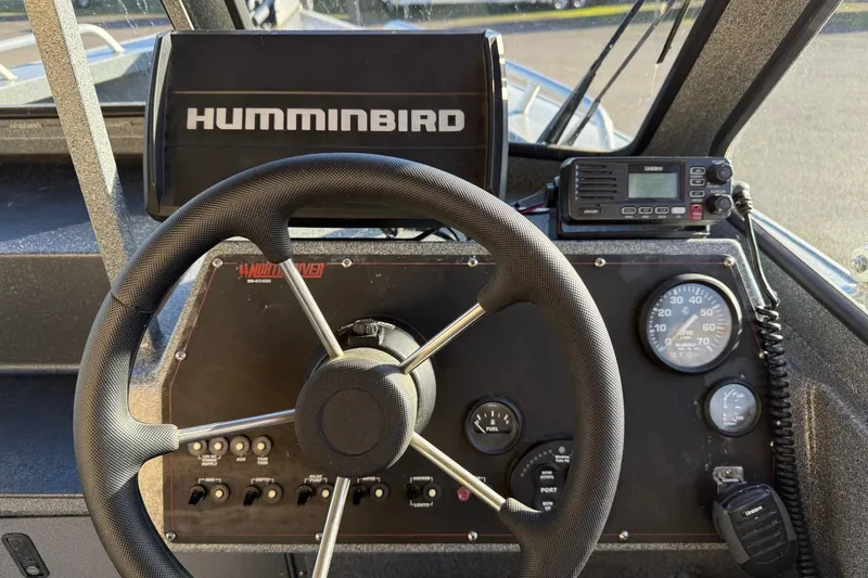 Slide: The Image of Steering console of a 2016 North River Seahawk boat with Humminbird electronics. - 15