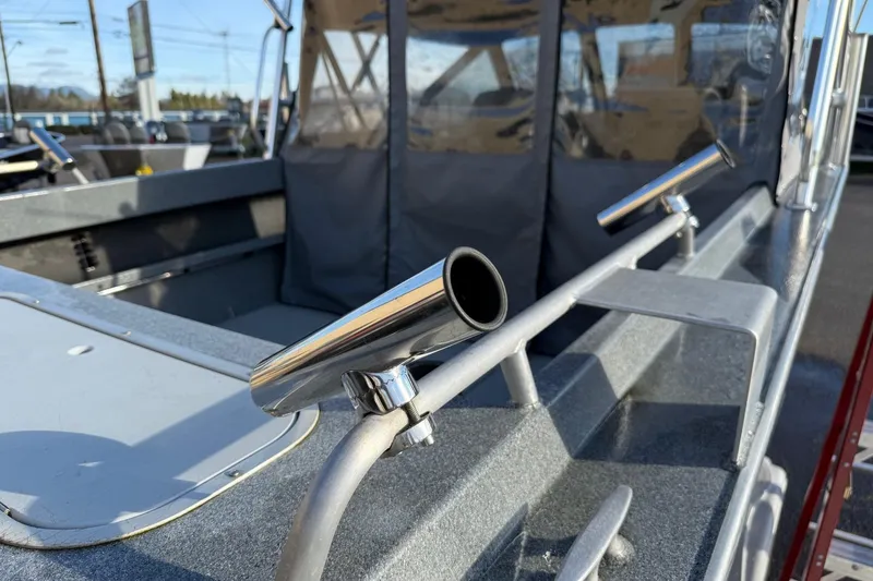 Slide: The Image of 2016 North River Seahawk boat with rod holders and seating area. - 9