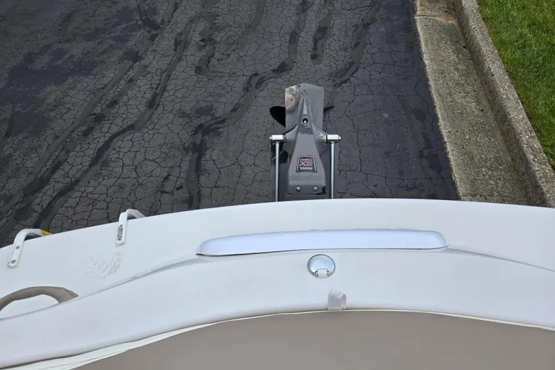 Slide: The Image of 1998 Four Winns 180 Horizon boat on cracked asphalt road, viewed from above. - 25