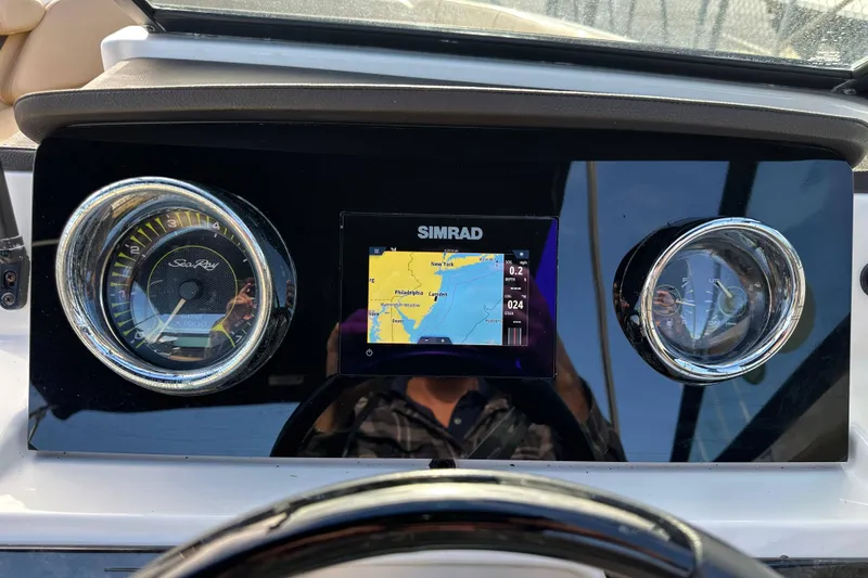 Slide: The Image of Dashboard of 2020 Sea Ray SPX 190 Outboard with Simrad navigation display. - 12