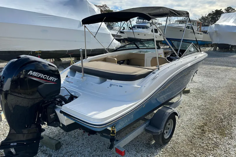 Slide: The Image of 2020 Sea Ray SPX 190 Outboard boat with Mercury engine on a trailer. - 22