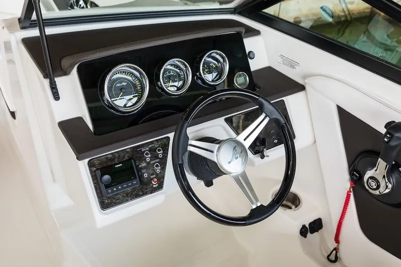 Slide: The Image of Manufacturer Provided Image: 2020 Sea Ray SPX 190 OB boat dashboard with steering wheel and instrument panel. - 24