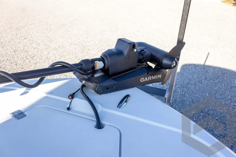 Slide: The Image of Garmin trolling motor on 2026 Caymas 26 HB boat deck, close-up view. - 35