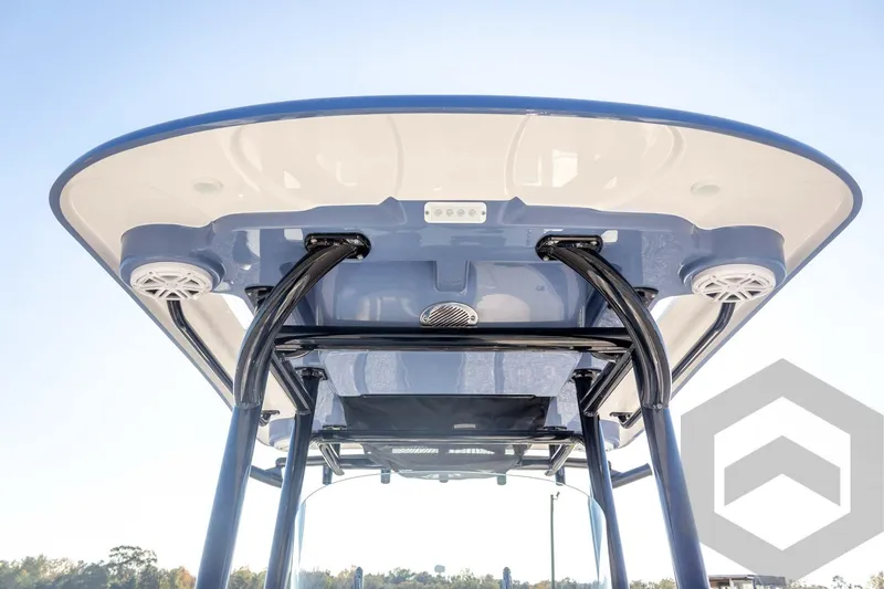 Slide: The Image of 2026 Caymas 26 HB boat T-top with speakers and sleek design. - 36