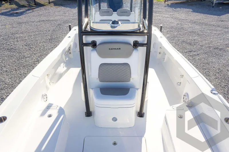 Slide: The Image of 2026 Caymas 26 HB boat interior with seating and console, showcasing modern design. - 39