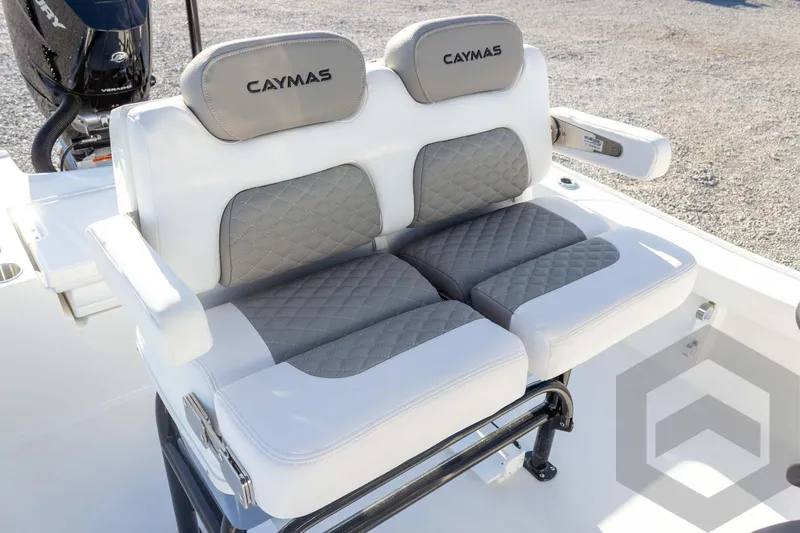 Slide: The Image of 2026 Caymas 26 HB boat seating with gray and white cushioned design. - 40