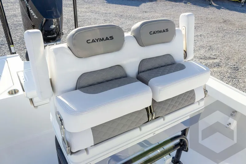 Slide: The Image of Caymas 26 HB 2026 boat seats with gray and white upholstery. - 41