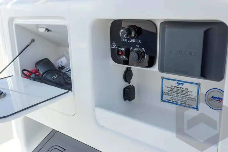 Slide: The Image of Control panel of 2026 Caymas 26 HB boat with RGB and JL Audio features. - 51