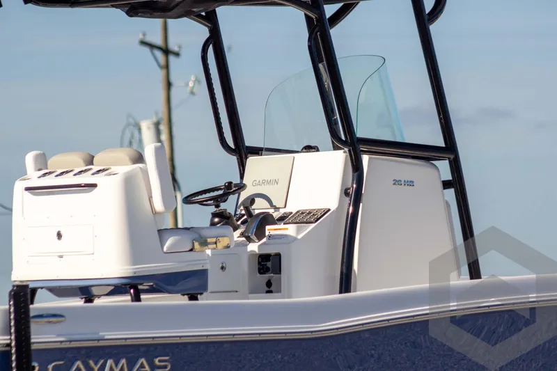 Slide: The Image of 2026 Caymas 26 HB boat console with Garmin navigation system, sleek design. - 6