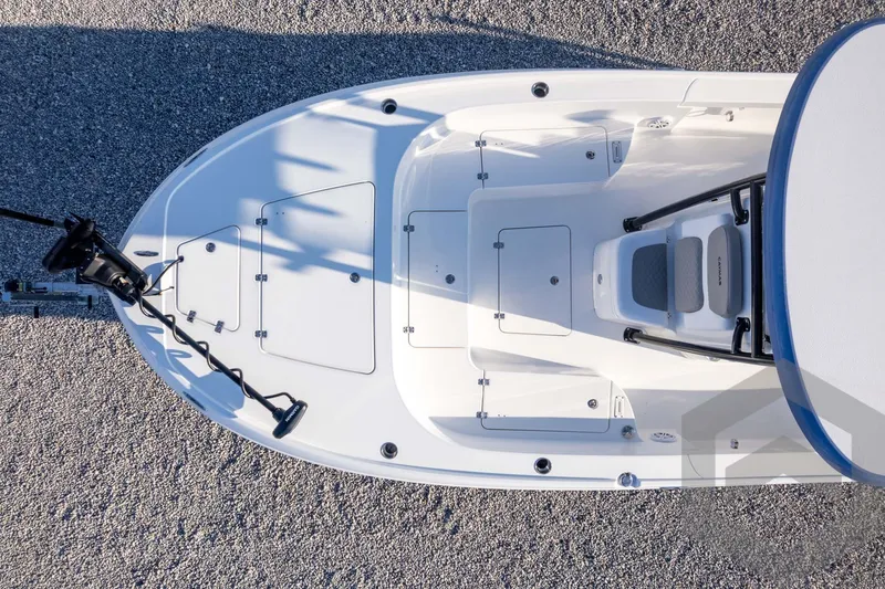 Slide: The Image of Top view of 2026 Caymas 26 HB boat deck with seating and storage compartments. - 67