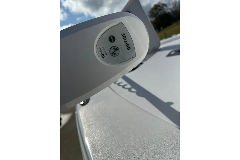 Slide: The Image of 2023 Sportsman Tournament 234 Bay Boat with Riptide trolling motor detail. - 22