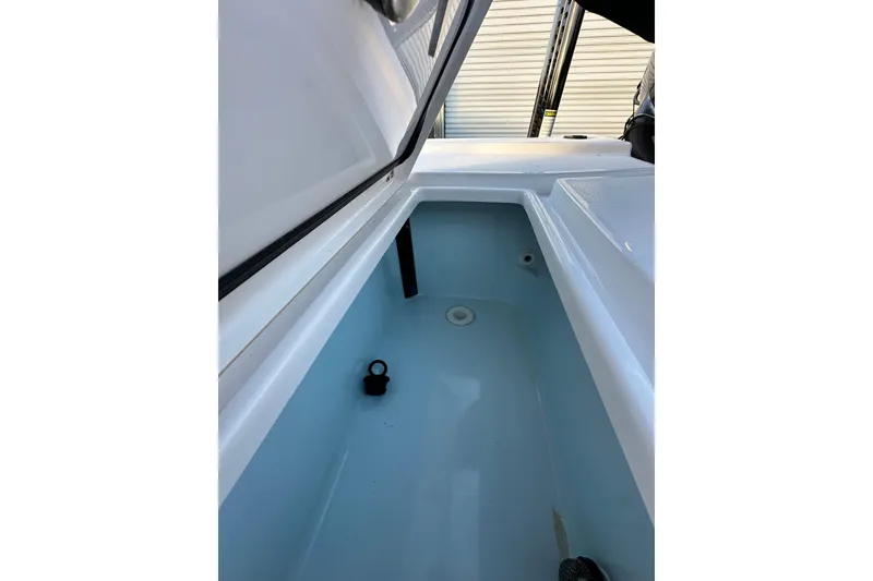 Slide: The Image of 2023 Sportsman Tournament 234 Bay Boat storage compartment, showcasing spacious interior design. - 69