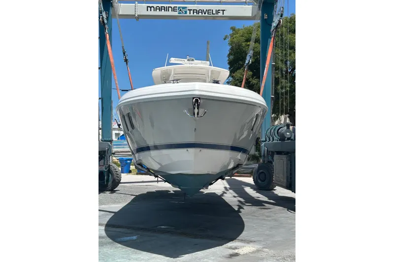 Slide: The Image of 2015 Intrepid 400 Cuddy boat on a Marine Travelift, ready for launch. - 2