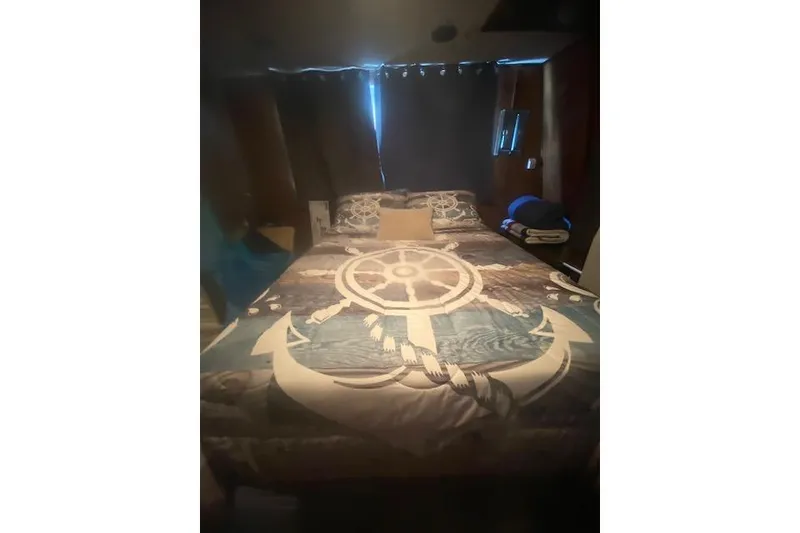 Slide: The Image of Cozy bedroom in a 1981 Sumerset houseboat. - 6