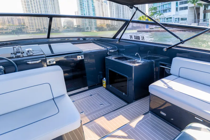 Slide: The Image of Interior of 2014 VanDutch 40 yacht with modern seating and sleek design. - 12
