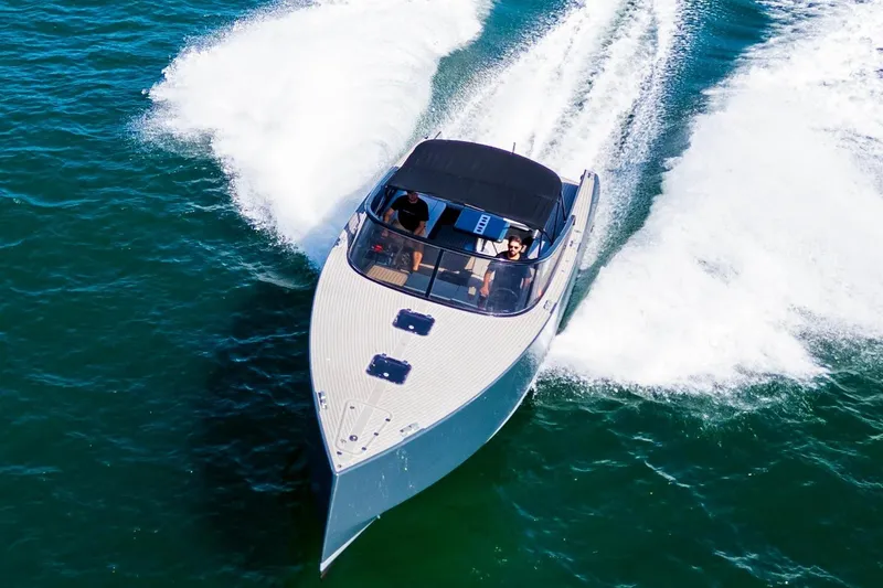 Slide: The Image of 2014 VanDutch 40 yacht cruising on the water. - 9
