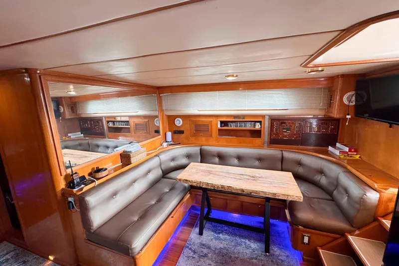 Slide: The Image of Luxurious interior of 2007 Albin 45 Command Bridge yacht with plush seating and elegant table. - 17