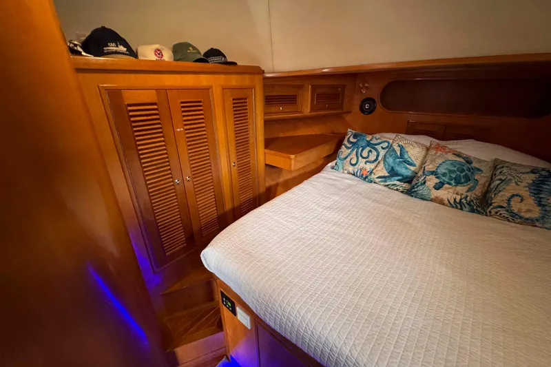 Slide: The Image of Cozy cabin interior of 2007 Albin 45 Command Bridge with nautical-themed pillows. - 25
