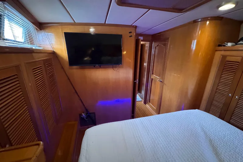Slide: The Image of Interior of 2007 Albin 45 Command Bridge with wood paneling and mounted TV. - 27