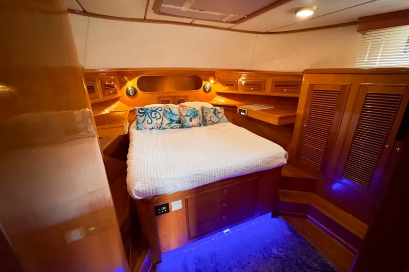 Slide: The Image of Luxurious cabin interior of 2007 Albin 45 Command Bridge with cozy bed and ambient lighting. - 29