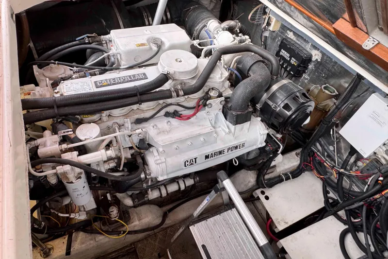 Slide: The Image of Engine compartment of a 2007 Albin 45 Command Bridge with Caterpillar marine engine. - 36