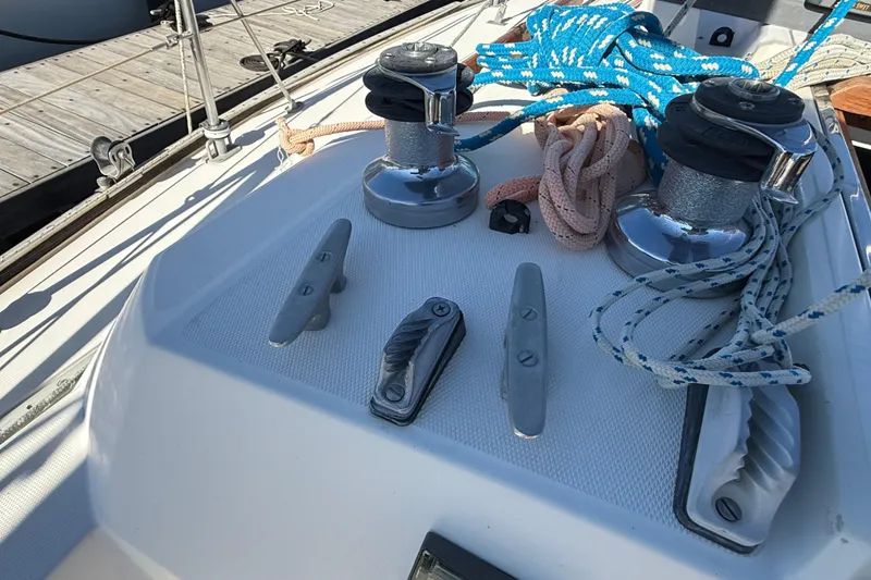 Slide: The Image of Deck of 1986 Sabre 30 MKIII sailboat with winches and ropes. - 11