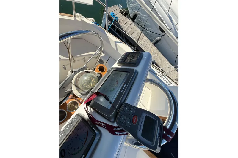 Slide: The Image of Cockpit of 1986 Sabre 30 MKIII sailboat with navigation instruments and compass. - 17