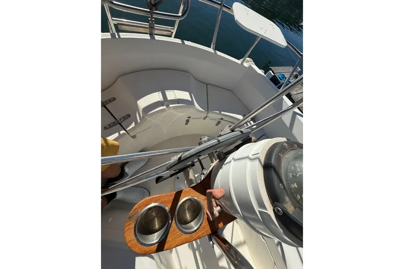 Slide: The Image of Cockpit view of 1986 Sabre 30 MKIII sailboat with compass and cup holders. - 18