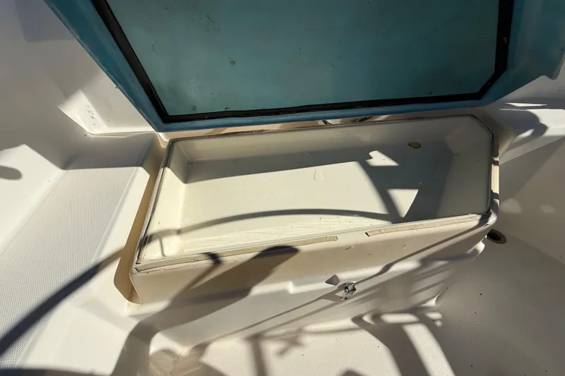 Slide: The Image of Open storage compartment on 1986 Sabre 30 MKIII sailboat, showing interior details. - 21
