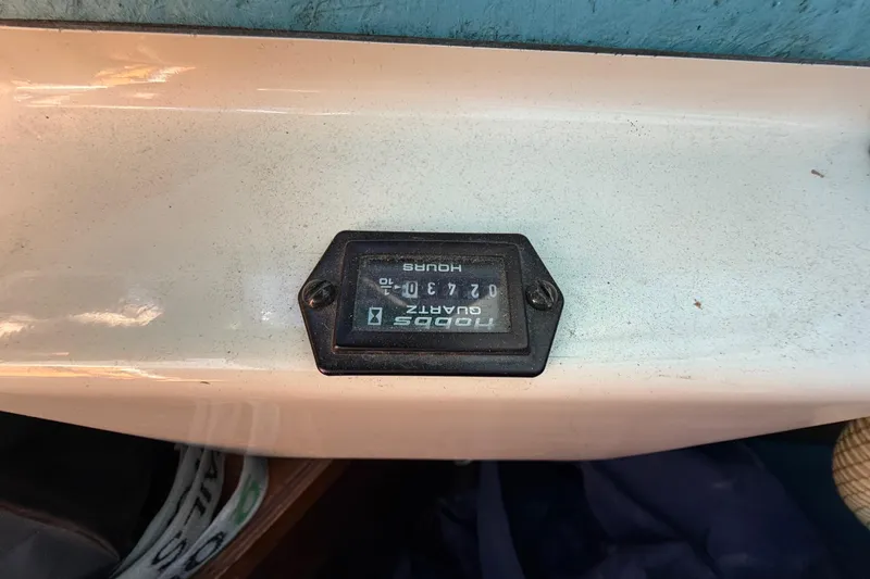 Slide: The Image of Hour meter on 1986 Sabre 30 MKIII sailboat dashboard. - 23