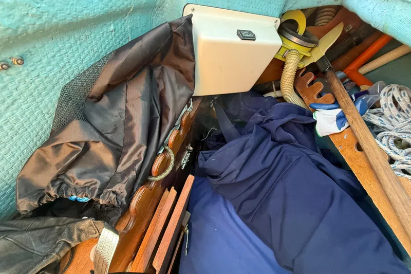 Slide: The Image of Interior of 1986 Sabre 30 MKIII sailboat with ropes and equipment. - 25