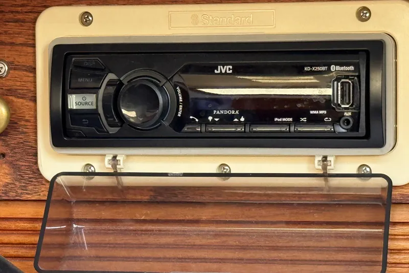 Slide: The Image of JVC KD-X250BT stereo system in a 1986 Sabre 30 MKIII boat dashboard. - 55