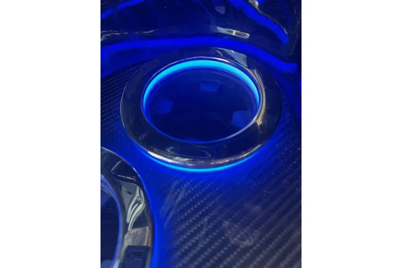 Slide: The Image of Illuminated cup holder in 2025 Nor-Tech 390 Sport Center Console boat. - 11