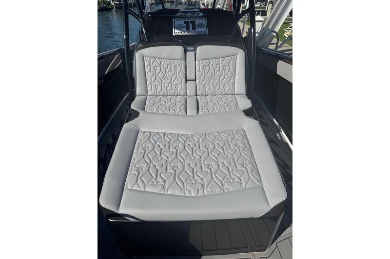 Slide: The Image of 2025 Nor-Tech 390 Sport Center Console with luxurious quilted seating design. - 15