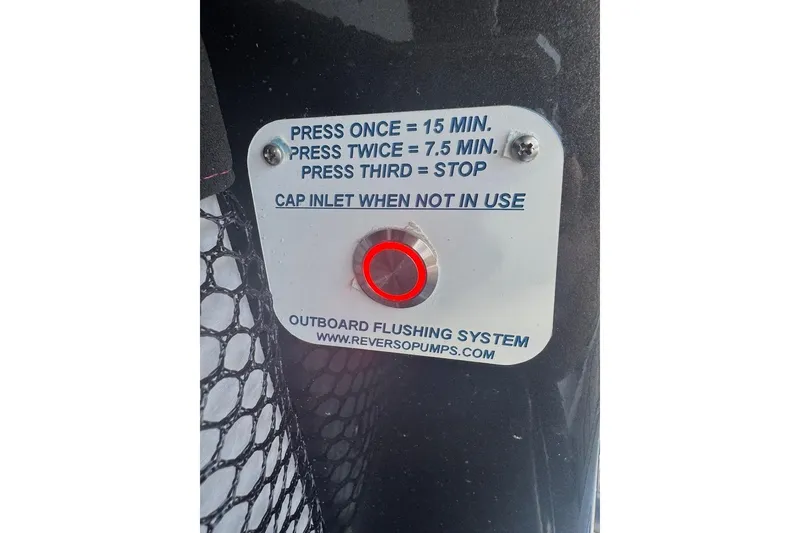 Slide: The Image of Outboard flushing system control panel on 2025 Nor-Tech 390 Sport Center Console. - 17