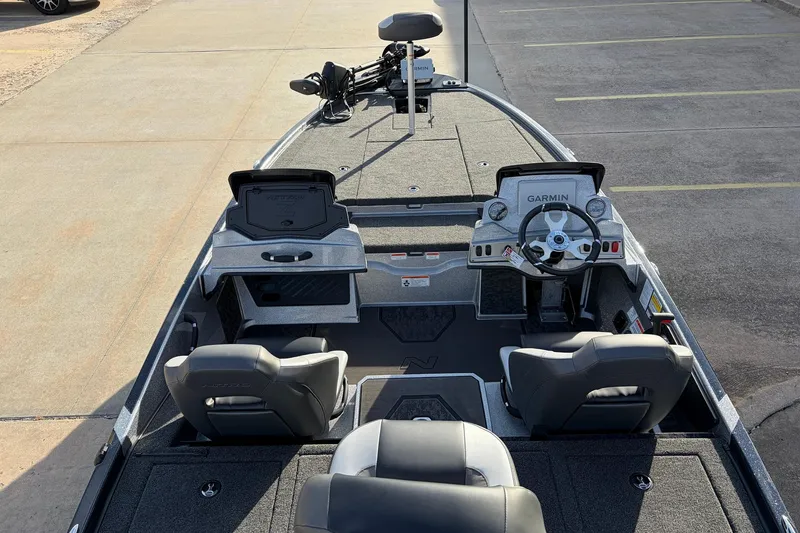 Slide: The Image of 2026 Nitro Z19 XL Pro boat interior with Garmin navigation system and dual seating. - 12