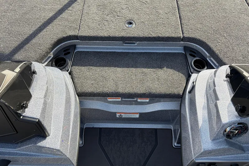 Slide: The Image of 2026 Nitro Z19 XL Pro boat interior with carpeted deck and cup holders. - 30