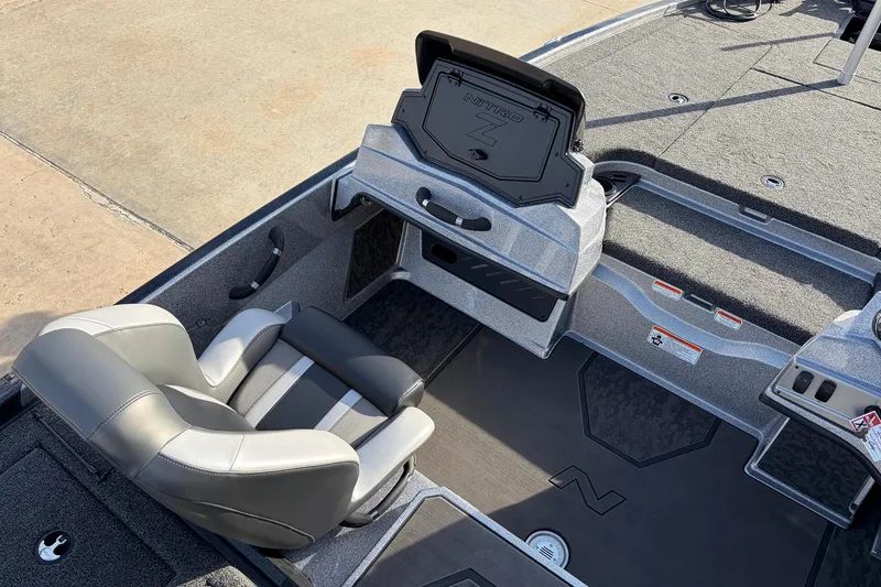 Slide: The Image of 2026 Nitro Z19 XL Pro boat interior with seating and storage compartments. - 34