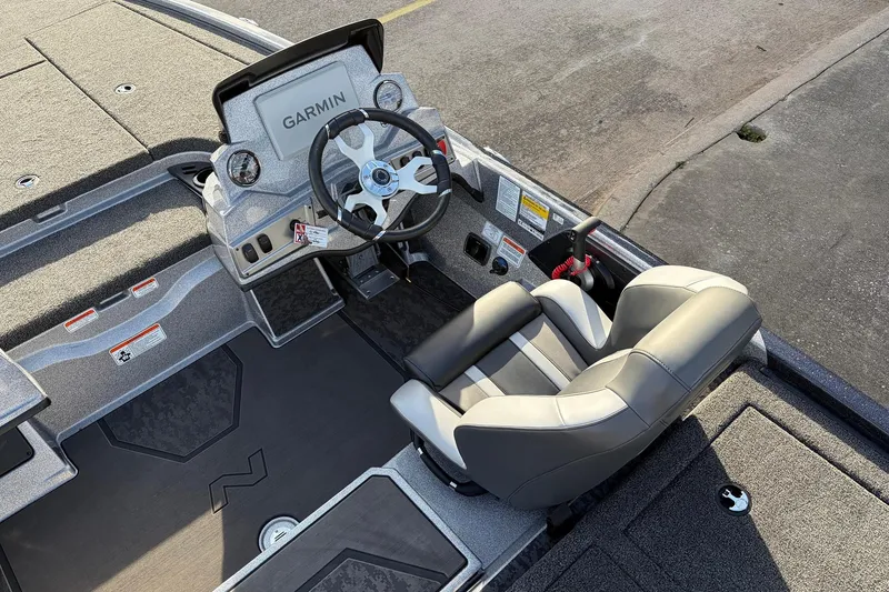 Slide: The Image of 2026 Nitro Z19 XL Pro boat cockpit with Garmin display and comfortable seating. - 35