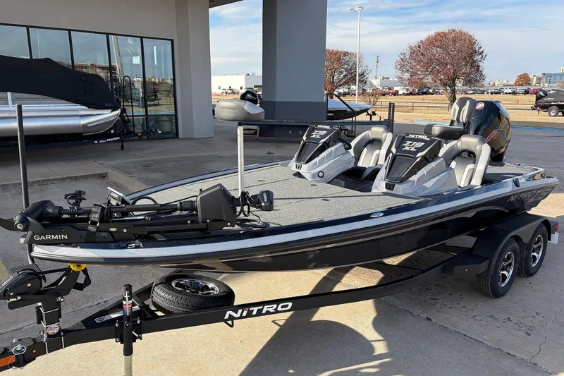 Slide: The Image of 2026 Nitro Z19 XL Pro fishing boat with Garmin equipment, parked on a trailer. - 4